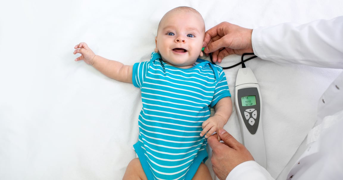 Newborn hearing screening and diagnosis at the hospital. Baby having hearing screening, Otoacoustic Emissions